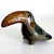 Offered is a vintage 1970s burnished ceramic toucan figurine from Tonalá in Jalisco, Mexico. The province is famed for its...