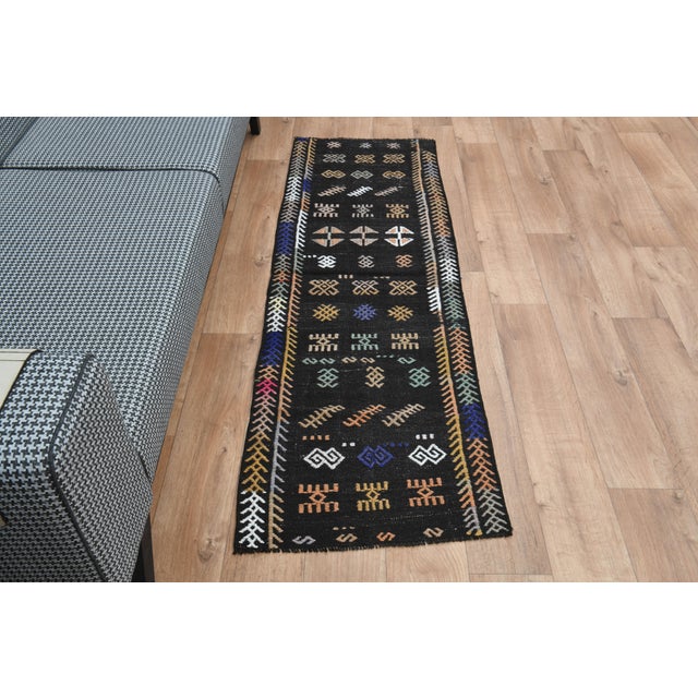 Vintage Turkish Hand-Knotted vintage rug is a semi-antique vintage area rug. The '70s Eastern region of Turkey's unique...