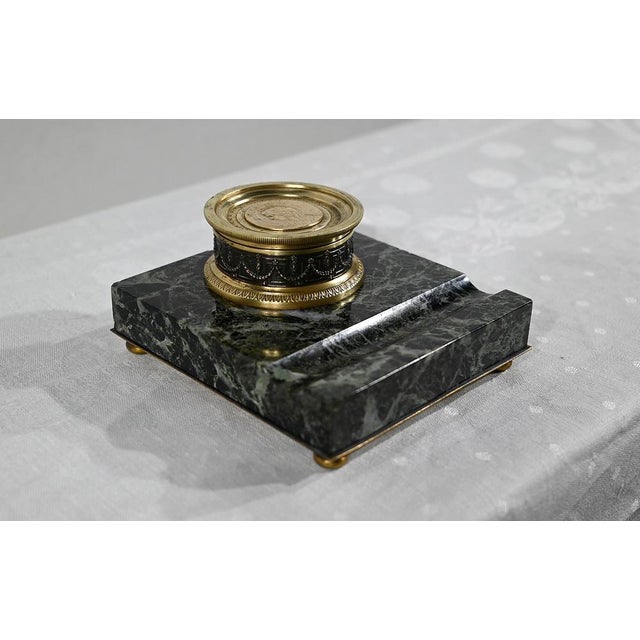 Finely chiseled circular inklift in the Louis XVI taste. Its lid presents a pastille by the Virgin representing the...