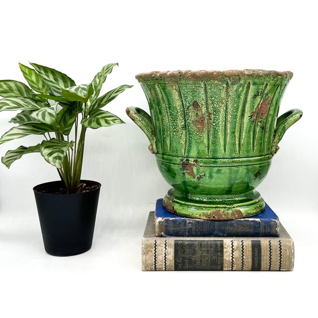Handsome vintage Italian terracotta planter by Vietri, finished in a rich verde green glaze with a beautifully weathered,...