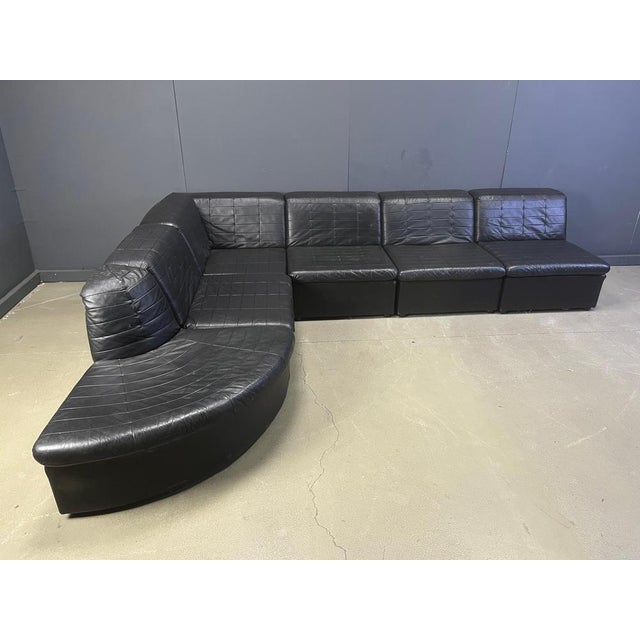 Vintage patchwork black leather sofa set by Laauser, germany. Completely modular sofa consisting of 6 elements. Good...