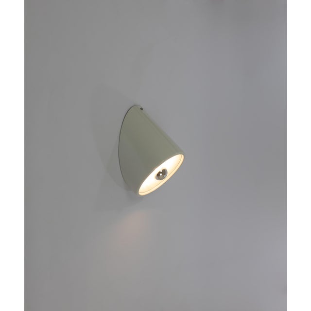 Wall or ceiling fixture, No. 235/b, designed by Cini Boeri and manufactured by Arteluce in 1971. The lamp consists of two...