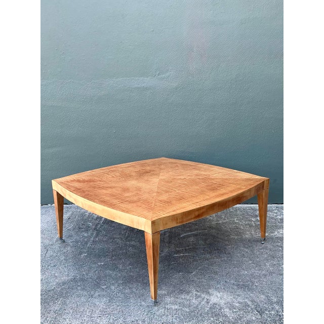 This magnificent square coffee table by Baker Furniture is a premier example of American high-end design, blending Neo-...