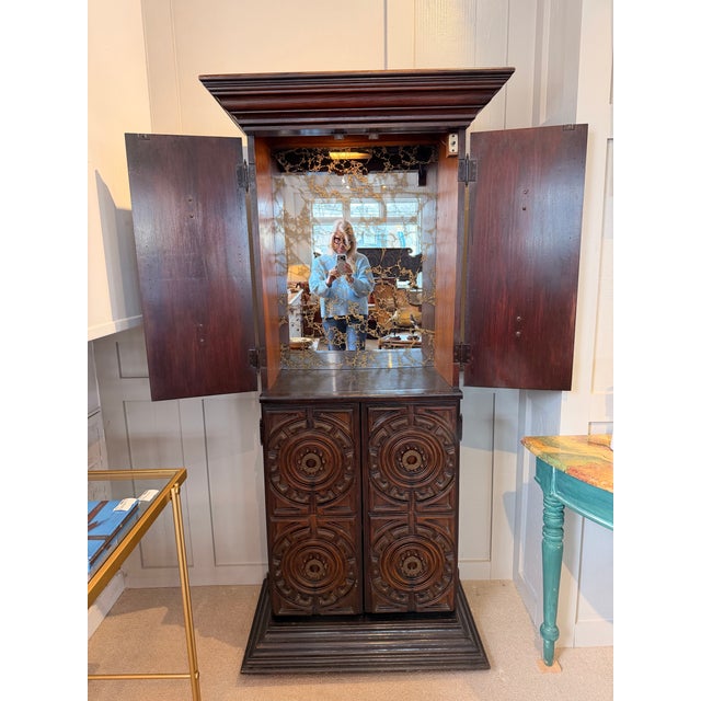 One of a kind! A super cool mid-century carved wood bar cabinet. This piece is so fabulous and a great size! Narrow enough...