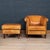 A charming tub chair and matching footstool, hand upholstered sheepskin leather by the finest craftsmen in holland. The...