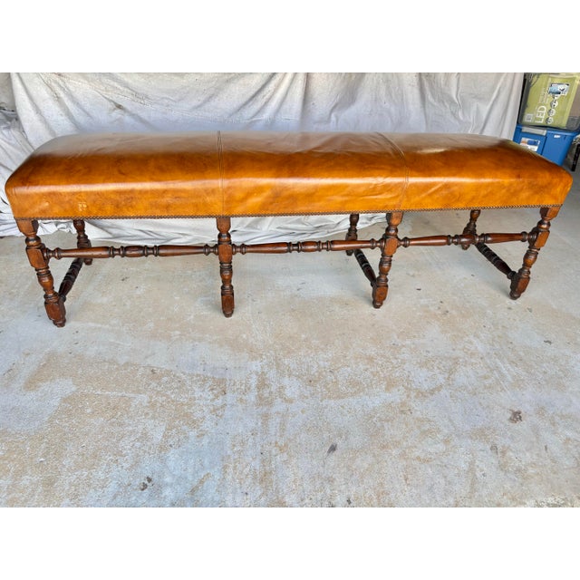 Found in the Provence region of France, this Late 19th Century Walnut and Leather Bench was handcrafted by artisans in the...