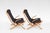Original Focus sling lounge chairs, designed in the 1970s and manufactured by Bramin Møbler in Denmark. The bent plywood...