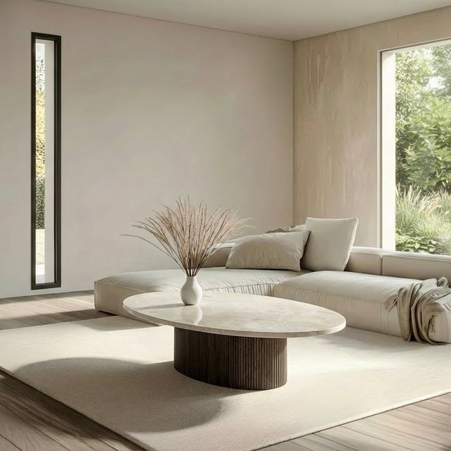 The valleyra coffee table, with its elliptical shape, evokes the mountains of natural stone quarries. like a gigantic,...