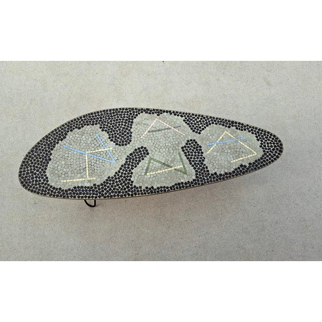 Small side table from the 1950s attributed to Berthold Müller Mosaic on particleboard with brass inlay Brass rim No...