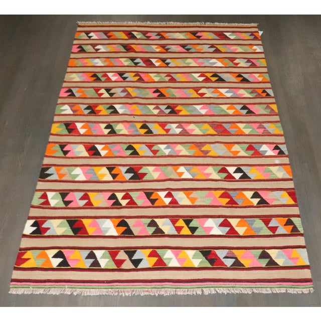 a mid 20th century Turkish Flatweave Colorful Kilim 5'5'' x 8'11''