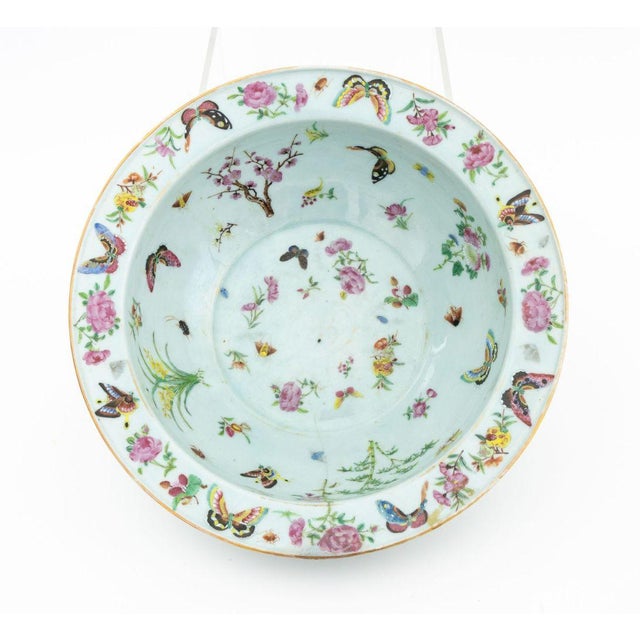 Chinese Famille Rose Porcelain Punch Bowl, hand-enameled with insects and flowers on a celadon ground. 4.75" H x 14.5"...