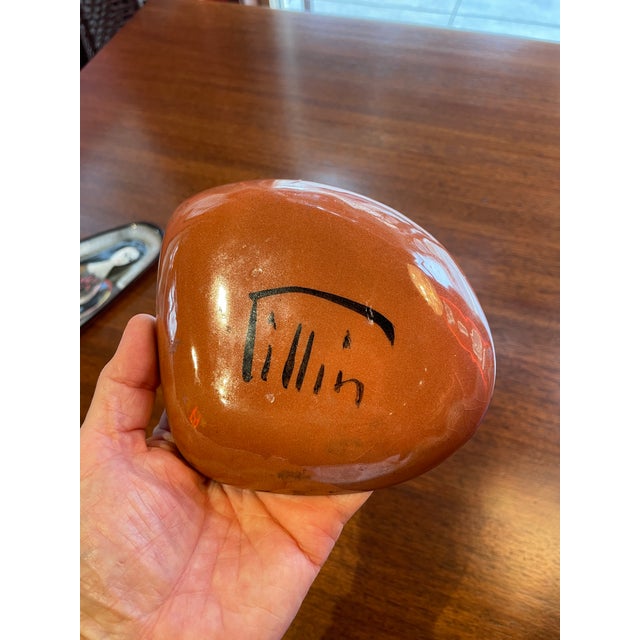 Polish-born Polia Pillin used engobe and glaze techniques to create mid-century motifs painted onto hand-thrown pottery...