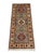 This Kazak-style wool runner has a gray field with three bold tribal medallions. A cream border frames the design, while...