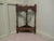 A Turned Oak Corner Stick and Umbrella Stand This is a very unusual piece, it is made from turned oak and it fits very...