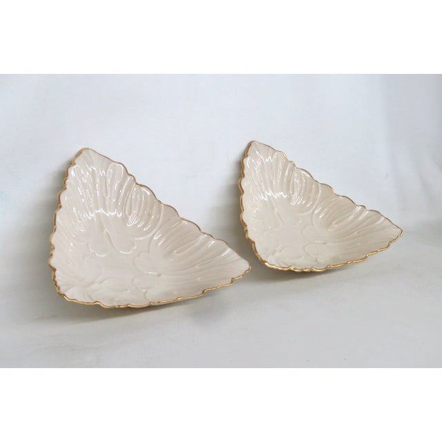 This beautiful Pair of 2 Triangle Dishes is made of porcelain. Both pieces are stamped on the bottom as being made in the...