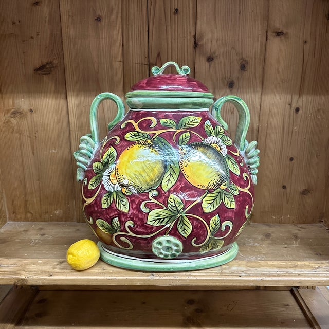 This is a giant of a vase. Generous and gorgeous it speaks of bounty and graciousness. In beautiful condition.lion head...