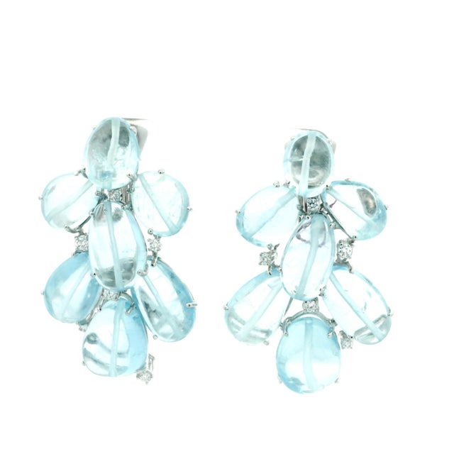 A beautiful pair of Italian-made chandelier earrings crafted in 18 karat white gold and designed around an impressive...