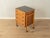 Beautiful chest of drawers from the 1960s. The body is finished in walnut veneer with four drawers and casters. The top is...