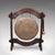 This is an antique dinner hall gong. An Oriental, country house fruitwood stand with bronze chime and cork ball striker,...