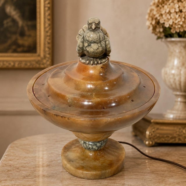 A beautiful early 20th century Italian Art Deco alabaster lamp, sculpted in warm honey, cream, and smoky gray tones with a...