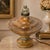 A beautiful early 20th century Italian Art Deco alabaster lamp, sculpted in warm honey, cream, and smoky gray tones with a...