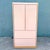 A striking postmodern armoire that perfectly captures the playful sophistication of late 20th-century design. Finished in...