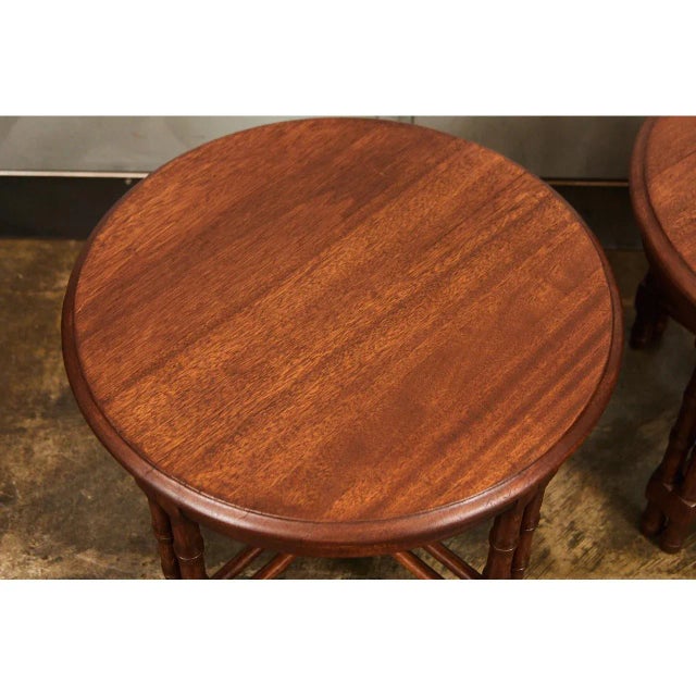 These beautiful walnut side tables are of a good size and shape for multiple uses. The have simple, modern design details...