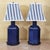 Striking pair of vintage hexagonal tea-caddy table lamps crafted in metal with a rich cobalt/navy blue enamel finish and...