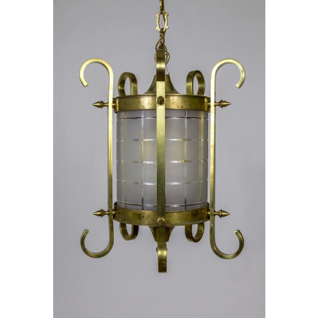 Brass and bronze lantern with unique, spike, and scroll details from the 1920s; holding a beautiful hand-etched, and...