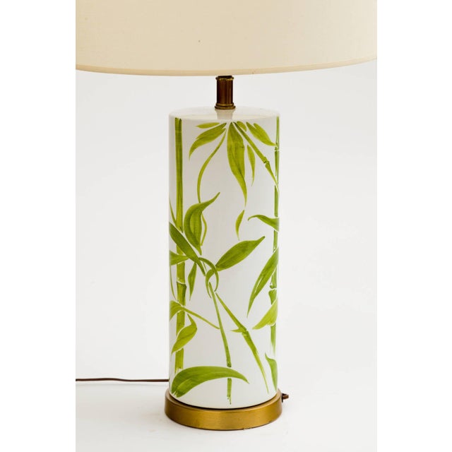 Italian ceramic cylinder lamp with hand-painted bamboo motif on brass base. Antique Chinese white jade butterfly finial....