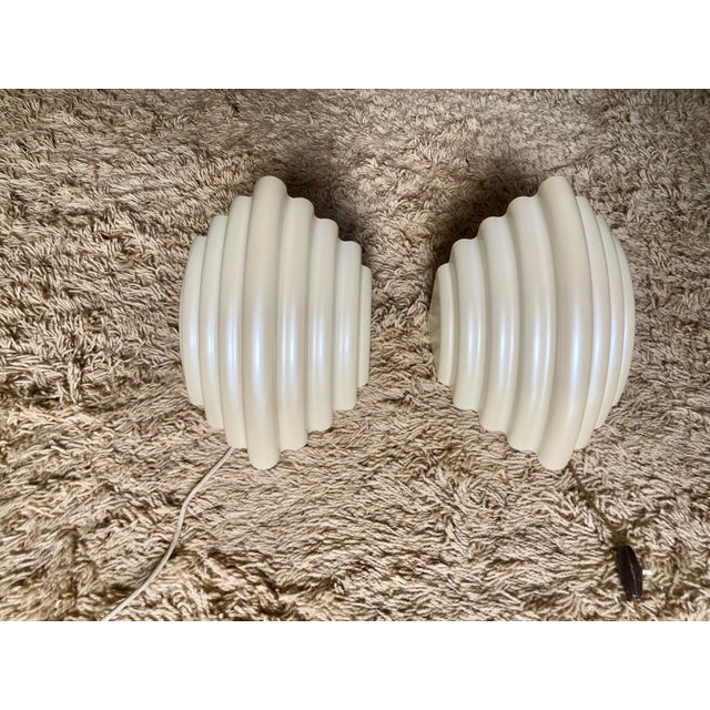 Tuki Wall Light by Kazuhide Takahama for Sirrah, 1980s, Set of 2, in Flawless conditions. Designed 1980 to 1989 This piece...