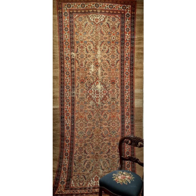 "This magnificent late 19th century Persian Serab camelhair rug is a piece that true connoisseurs of fine weaving seek...