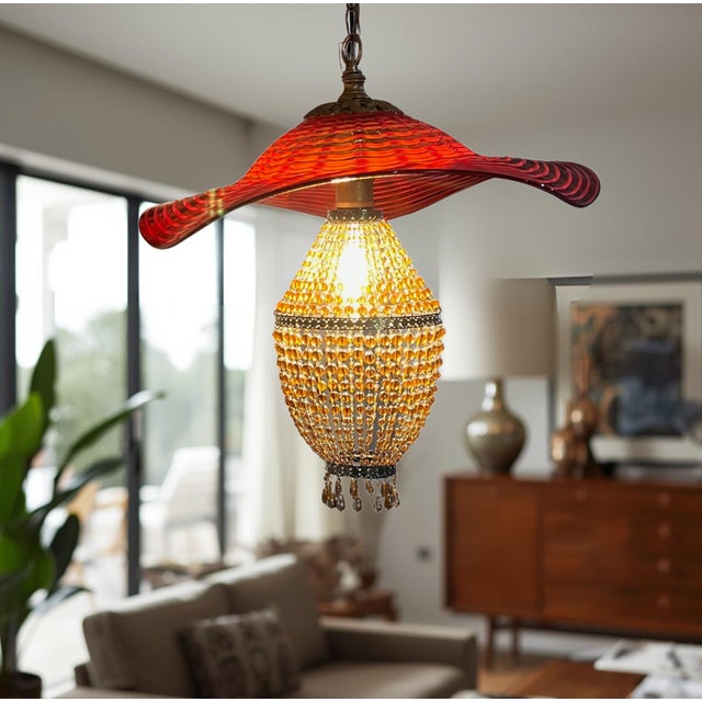 This one-of-a-kind pendant light is a sculptural statement that unites Venetian glass artistry with refined mid-century...