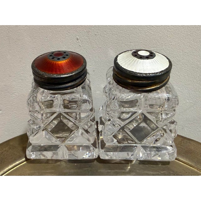 Beautiful vintage Norwegian cut crystal salt and pepper shakers with sterling silver and guilloche enamel tops marked...