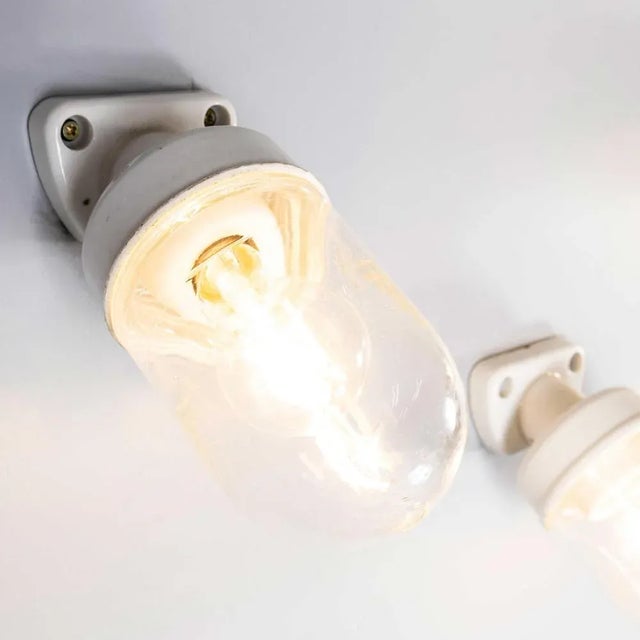 1950’s new old stock ceramic and glass angled wall lamps – medium. Good practical fully original industrial wall lamps....