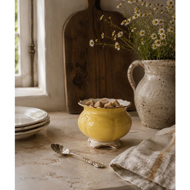 A cheerful and elegant little piece from one of England’s finest china houses, this Aynsley bone china cachepot is...