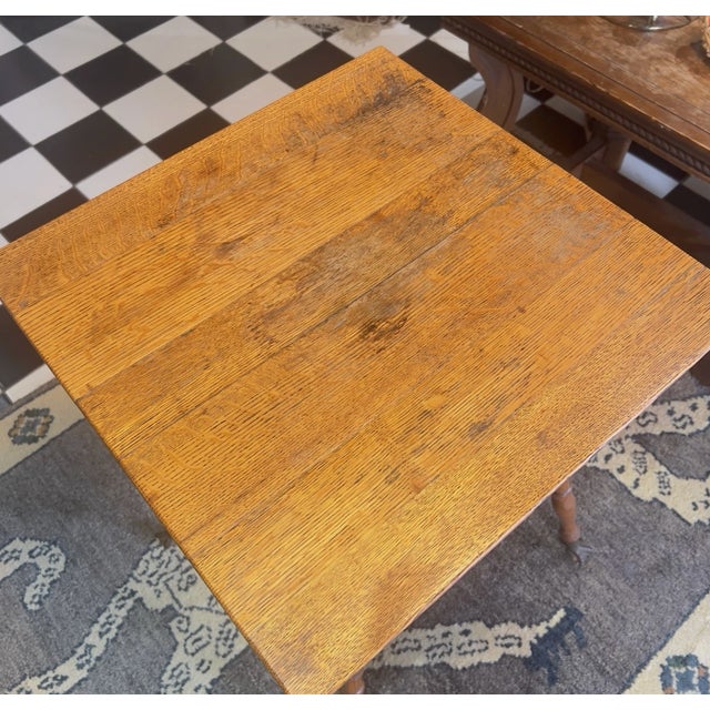 Beautiful classic antique parlor or side table. Solid oak wood construction featuring a two tier design with a square top....