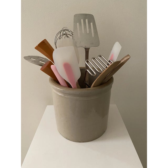 An antique Red Wing Stoneware small crock. Perfect use for kitchen utensils or dried flowers for a beautiful rustic...