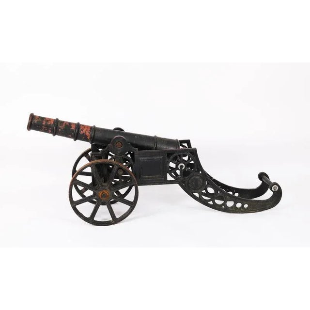 This is a superb antique decorative cast iron signal cannon mounted on a two-wheeled carriage, and dating from Circa 1920....