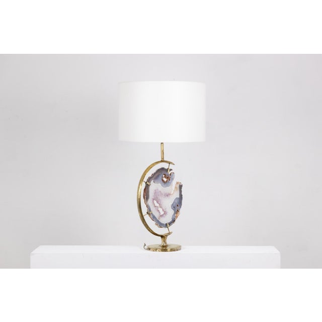 Round bronze and amethyst lamp. 1970s designer work. 20th century decoration. Classic interiors. This piece is designed in...