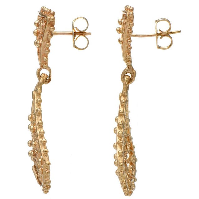 These stunning beaded earrings dangle majestically from the wearer in the most glorious way. The lovely yellow-gold...