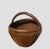In well-aged brown color, this beautifully hand woven basket was used to carry fresh vegetables from the village open...