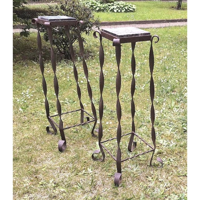 Pair of mid century Brutalist wrought iron and marble garden columns, patinated iron, solid construction, beautifully...