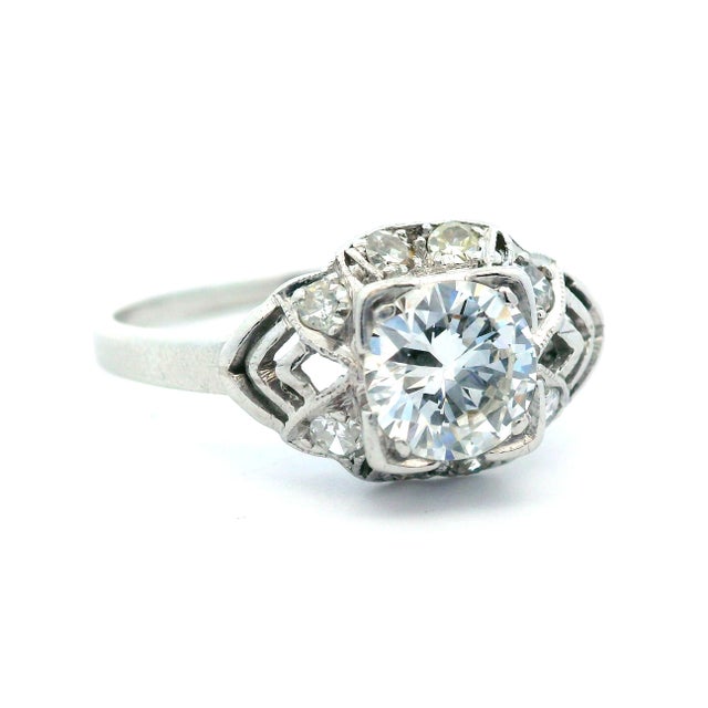This incredible ring comes from the 1920 Art Deco period and features an incredible diamond. The Art Deco band is made in...