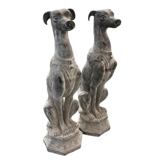 Pair of Mid-Century Hollywood Regency Cast Iron Seated Sighthound Statues For Sale