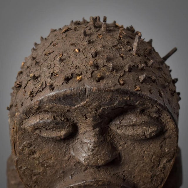 The Mambila Tadep Guardian Figure is a captivating cultural artifact from the Mambila people of Cameroon, an ethnic group...