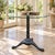 A sculptural vintage cast-iron plant stand or display pedestal in the Neoclassical Revival taste. The piece features a...