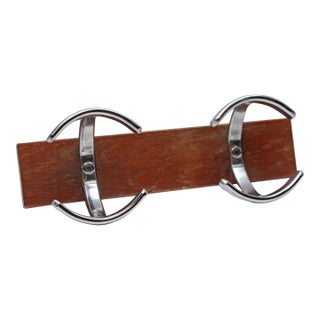Mid 20th Century European Chrome Double Arch Hooks on Dark Tone Wood Wall Rack For Sale