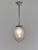 FRENCH ART DECO LANTERN A pendant light made circa 1930. A mounting in nickel plated bronzer or solid brass holds a...