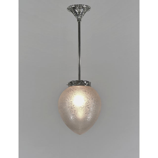 FRENCH ART DECO LANTERN A rare pendant light made around 1930. A mounting in nickel plated bronzer or solid brass holds a...